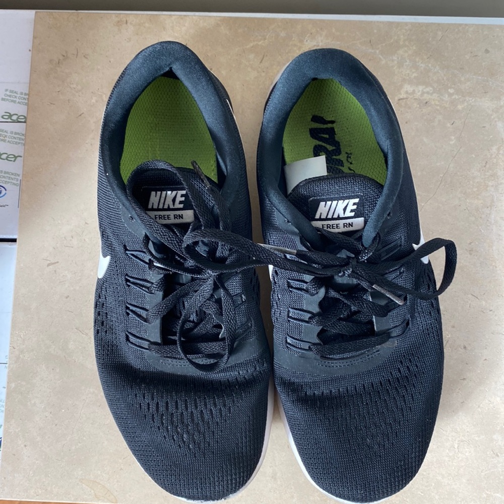 Black Nike running sneakers